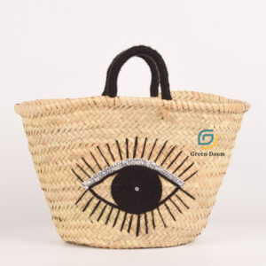 Panier en paille Aicha, motif œil et anses en laine - Green Doum