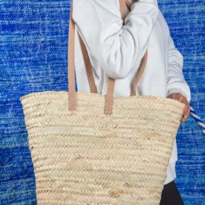 Large palm leaf basket with long handles by Green Doum